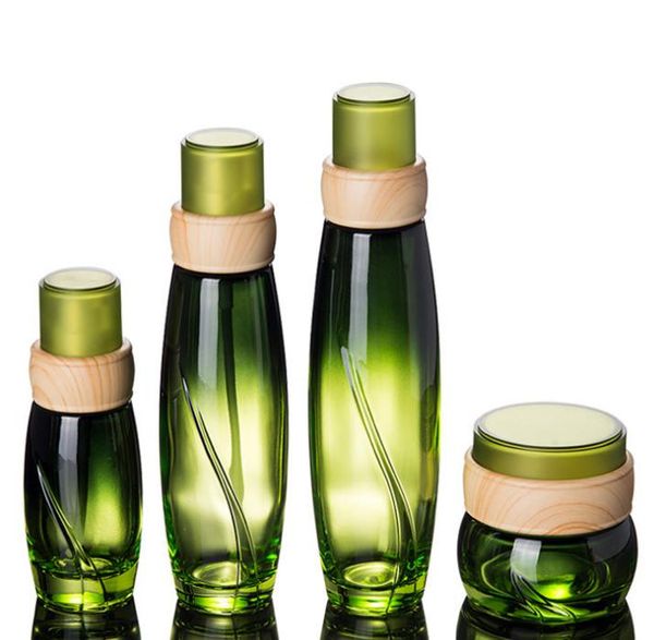 40 ml 100 ml 120 ml 50 pcs/lot bouteille en verre vert avec pompe à pression en bois forme couvercle bouteilles de Lotion pour le stockage d'emballage cosmétique