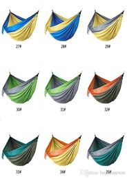 Hamaca de nailon de 44 colores con mosquetón de cuerda Hamaca de tela de paracaídas para exteriores de 10655 pulgadas Columpio plegable para acampar en el campo Cama colgante B9943179
