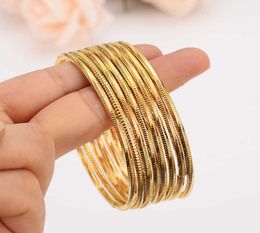 4 stks Dubai India Gouden Armbanden Vrouwen Mannen Armbanden Afrikaanse Europese Ethiopië Meisjes Kids Sieraden Bruid Armbanden Gift Enkelbandje Q07224272592