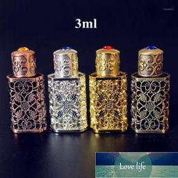 4 stks / partij 3ML antiqued metalen parfumfles lege Arabische stijl legering uitgeholde essentiële oliën fles met glazen druppelaar1