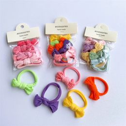 5 stuks Nieuwe Koreaanse Zoete Meisje Prinses Paardenstaart Haaraccessoires Mode kinderen Eenvoudige Kleurrijke Boog Handdoek Haar Ring Hoofddeksels