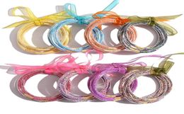 5 PCSSET Bowknot Glitter Bangles Fiest Girls All Weather Stack Silicona Plástica Galatería Pulsera WLL10102213505