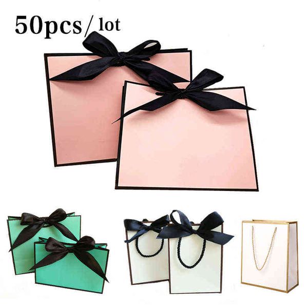 50/100pcs boîtes de sacs-cadeaux personnalisés, sacs en papier de grande taille sac cadeau en or pour pyjamas vêtements emballage Eith poignée H1231