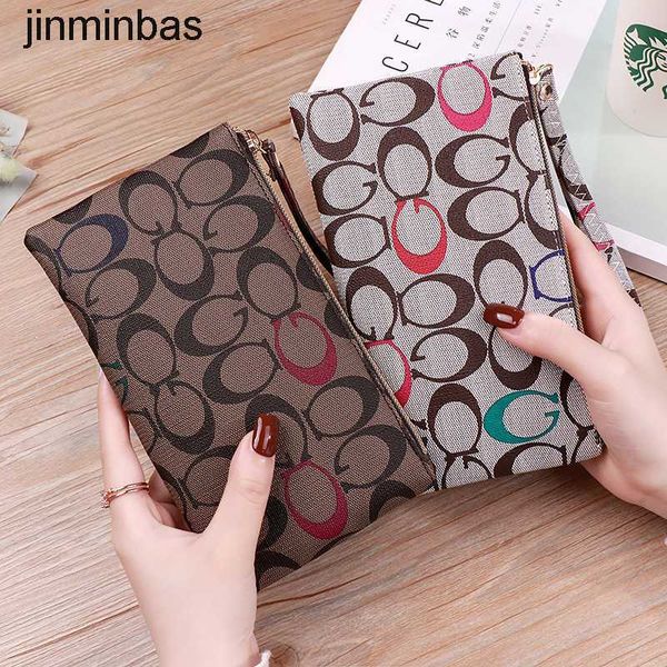 50% de réduction dans les magasins 2023 Fashion Bag New Leisure Long Hand Simple Shopping Zero Wallet Mobile Phone Women's Hand