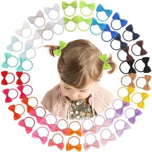 50 stuks 2 inch baby meisjes bogen elastische banden grosgrain lint boog met rubberen band paardenstaart houders haaraccessoires