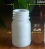 HDPE les bouteilles d'emballage en plastique de 50g grandes bouteilles rondes bouteille d'échantillon avec une résistance de capuchon intérieur à 1000pcs acides et alcalins