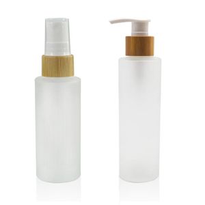 50 ml 100 ml 120 ml 150 ml Botellas de bomba de spray de vidrio esmerilado de hombro plano con tapa de bambú para el cuidado de la piel Suero Loción Champú Gel de ducha Artículos de tocador