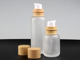 50 ml parfumfles matglasflessen met houten korrel/wit/zwart deksel draagbare pomplotion glazen fles