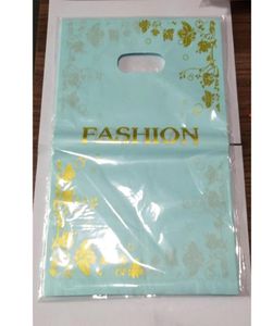 50 stks 2535cm Gold Flowers Design Blue Plastic Gift Bag Kleding Boutique verpakkingszakken Grote plastic boodschappentassen met handgrepen3186815