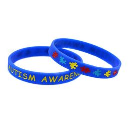 50 pulseras de goma de silicona para concienciación sobre el autismo grabadas y rellenas en color, logotipo de rompecabezas, tamaño adulto, 5 colores53149654138566