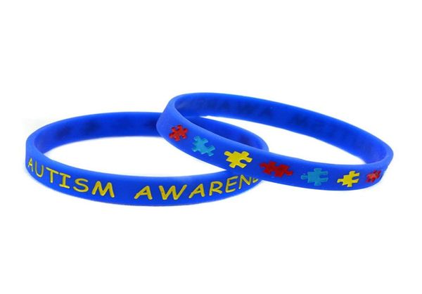 50 pulseras de goma de silicona para concienciación sobre el autismo grabadas y rellenas en color, logotipo de rompecabezas, tamaño adulto, 5 colores53149653408203