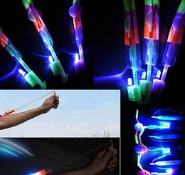 50 Uds. Regalo de Navidad LED flecha increíble helicóptero volador paraguas juguetes para niños OVNI espacial, juguetes con luz LED