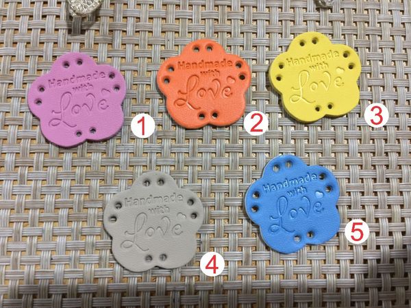 Etiquetas de cuero Parche de cuero personalizado Venta al por mayor 50 piezas Medias de cuero de pu hechas a mano en venta 28 mm 27 8 mm hecho a mano