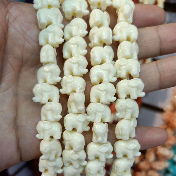 50pcs / lot 14mm perles de corail en forme d'éléphant pour la fabrication de bijoux en vrac blanc rouge orange violet rose perles de corail accessoires de bricolage 268f