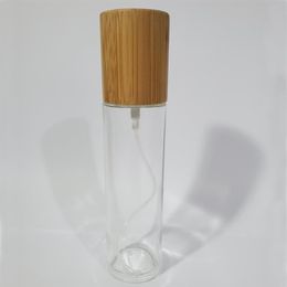 50pcs / lot 30 ml 50 ml 100 ml 120 ml bouteille en verre transparent avec pompe à lotion en bambou bouteilles d'émulsion verre vide emballage cosmétique 230t