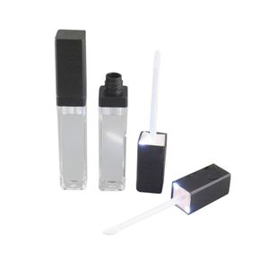 50 unids/lote, tubo contenedor de botella de brillo de labios con luz LED de 7 ml con espejo adjunto en una cara, tapa negra y plateada