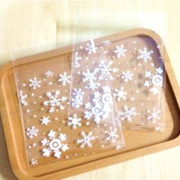 50pcs / lot Nouveau arrivée 10x10cm Sac à biscuit de flocon de neige de Noël clair, sceau d'auto-adhésif en plastique en plastique, sacs violonceau à violon