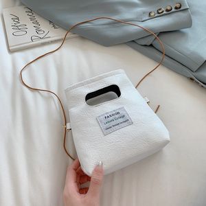 50pcs sacs de messager femmes PU uni ouvert petit sac à bandoulière couleur de mélange