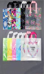 Sacchetto di plastica da 50 pezzi con manico Fiore Cartone animato sacchetto regalo carino Borse per imballaggio regalo in stoffa per la spesa di grandi dimensioni3580915