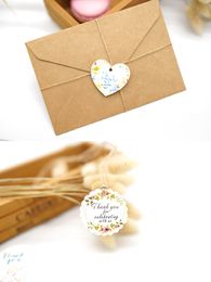 50pcs merci étiquette d'étiquette de cadeau de papier kraft kraft pour les produits de package de création de produits de mariage / bonbons / bébé