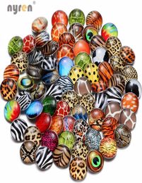 50pcslot charme mixte 18 mm animal léopardstripe thème thème instantané pour le collier bracelet snap bricolage bijoux5403157