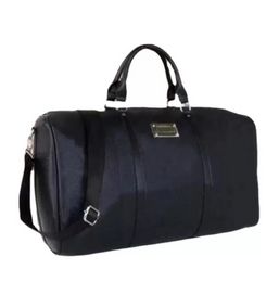 55CM grande capacité femmes sacs de voyage vente qualité femmes hommes sacs à bandoulière porter des rivets inférieurs de bagages avec tête de verrouillage 118