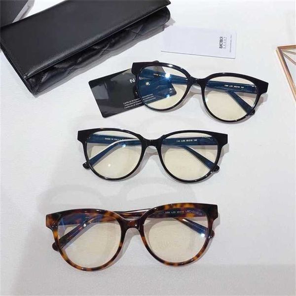 58% Gafas de sol de alta calidad Nuevas gafas de luz plana Xiaoxiangjia para mujer Mismo estilo Placa negra Marco de ojos de gato de moda ch3394