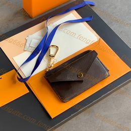5A Diseñador de alta calidad Moda Exclusivo Llaveros Paquete de tarjetas Ocio Mini Zippy Wallet Cuero en relieve Monedero Bolsas Dermis Charm Key Bolsa con caja