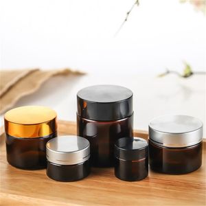 5g 10 g 15 g 20g 30 g 50g Amber bruin glazen pot lege navulbare gezichtscrème fles cosmetische make -up opslagcontainer met gouden zilveren zwart deksel en binnenkant.