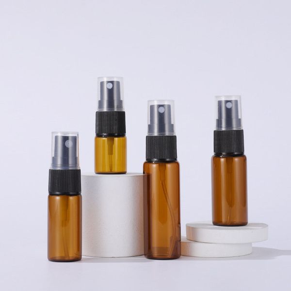 5 ml 10 ml 15 ml 20 ml Botellas de spray de vidrio ámbar Venta al por mayor Botella de perfume de aceite esencial con pulverizador de bomba negra Tapa transparente para perfume cosmético