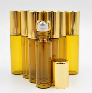 5ml Ambre brun Parfums HUILE ESSENTIELLE en acier inoxydable Roller Ball Gold Cap Vente en gros