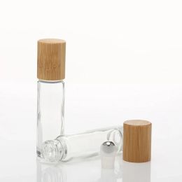 5pcs 10 ml de verre transparent en verre transparent à l'huile essentielle sur bouteille avec bambou Baule en bois / rouleau en métal pour aromathérapie de parfum