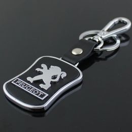 5pcs lot Top Fashion Car Keychain pour Peugeot Metal Le cuir clés de la chaîne de clés Llaveros Chaveiro Emblem Holder269s