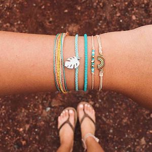 5pcs Bracelet d'amitié tissé multicouche, bracelet de corde de surf, bijoux féminin en gros, perles de feuilles arc-en-ciel, réglable