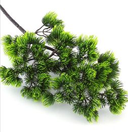 5pcs Branches d'arbres de pin Plastics artificiels Pinaster Plantes de Noël Décoration d'arbre de Noël Fleurs Arrangement feuilles couronne2528455