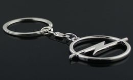 5PCSLOT Fashion Metal 3d Car Logo Keychain Keychain Chain Keyring Key Ring Chaveiro Llavero pour Opel Auto Pendant Car Accessories Whol5651753