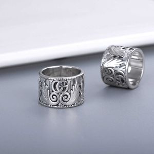 60% OFF 2023 Nouveaux bijoux de mode de haute qualité de luxe pour double argent thaïlandais en trois dimensions sculpté motif de plumes d'aile d'ange hommes et femmes même bague de couple