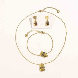 60% korting op designer sieraden halsketting ring Accessoires Titanium staal olie parfum fles set dubbele dames oorbellen armband