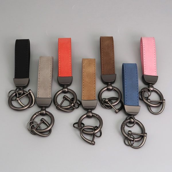 100 pcs réel lleather key ring keychain ajustement pour Benz Land Rover AMG Toyota