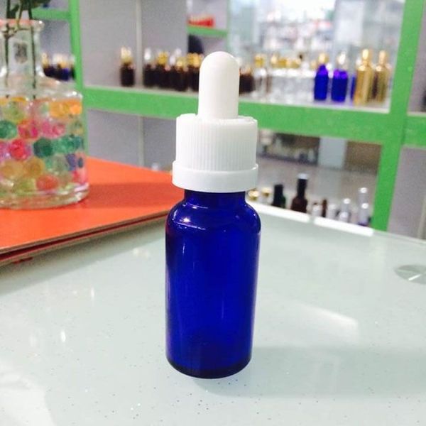 600 piezas botellas cuentagotas de vidrio 30 ml 5 ml 10 ml 15 ml 50 ml E-líquido botellas de jugo de aceite esencial botella azul de vidrio con Rubbe244F a prueba de niños