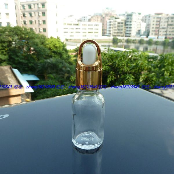 

15ml clear/transparent glass essential oil bottle with aluminum basket shiny gold dropper cap, essential oil container