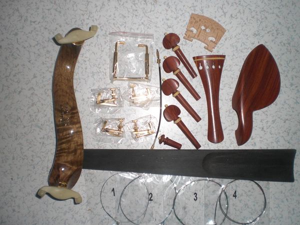 

1 set rose wood fittings 4/4 with bridge shoulder rest string fine tuner etc