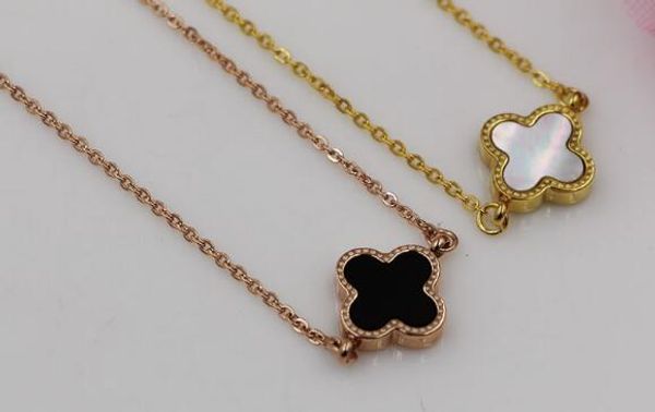 

Korean version of the side of white color black Clover double-sided bracelet female rose gold titanium anti-allergy