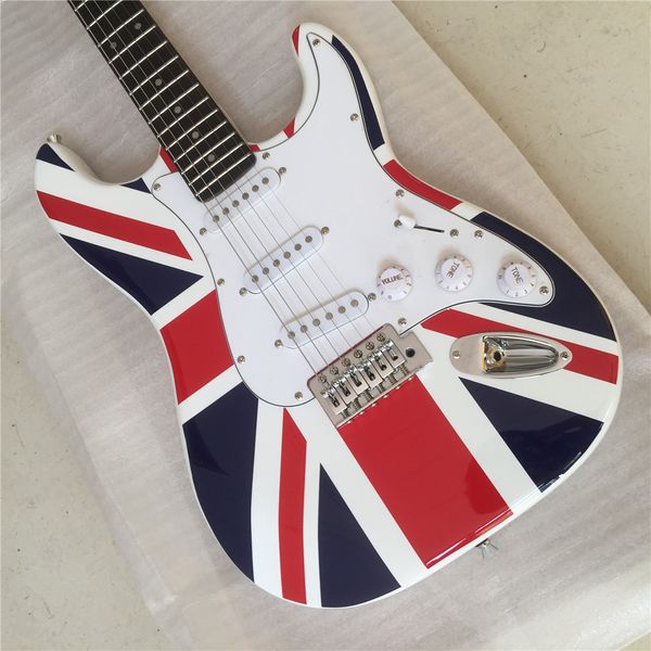 

custom shop,st electric guitar,quality assurance,the white body has a british flag on it.real guitars guitarra