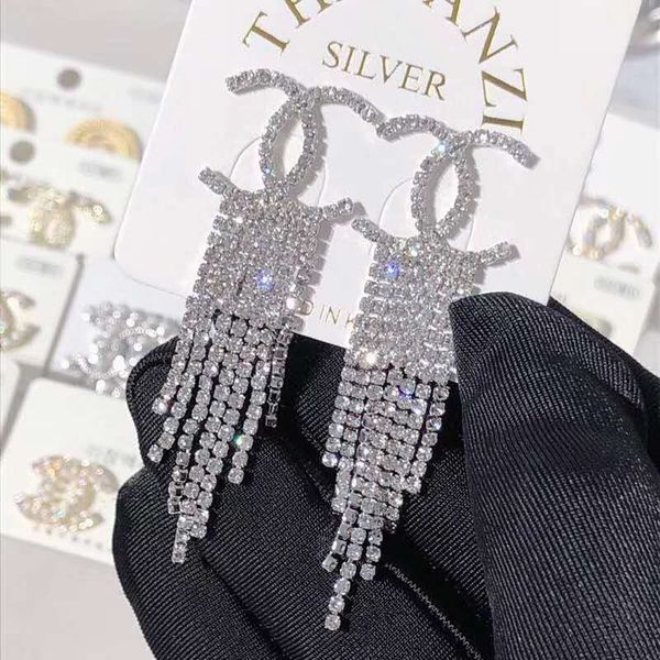 

Cla ic temperament big name et zircon ta el long earring fa hion exaggerated atmo phere dre dinner acce orie