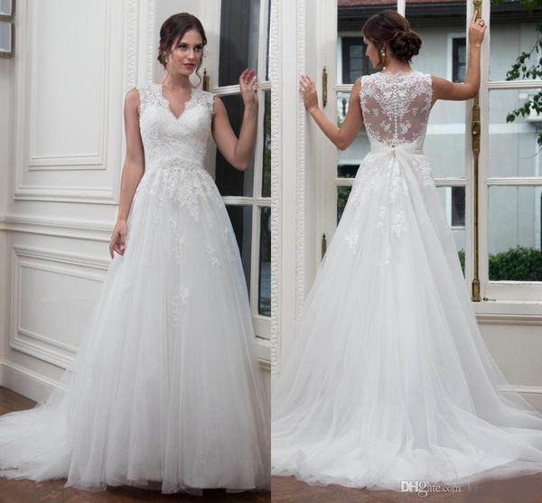 

2020 stunning spring milla nova wedding dresses sheer long sleeves beaded neck appliqued crystal tulle floor length bridal gowns, White