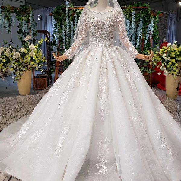 

bohemian ivory wedding dresses illusion o neck tulle long sleeve open keyhole back crystal sequins beach wedding dresses abiti da sposa, White