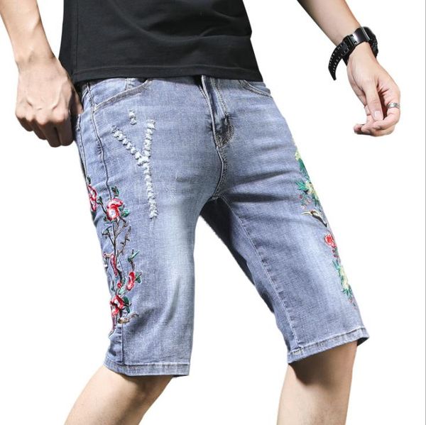 pantaloncini jeans strappati uomo