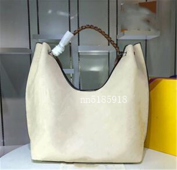 

2020 2019 leather new leather perforated handbag fashion shopping bag large capacity shoulder bag size 35*40*17cm ing