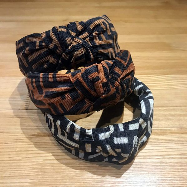 

Fa hion headband girl vintage knitting twi ted knotted letter headband wide hair band head wear acce orie three color